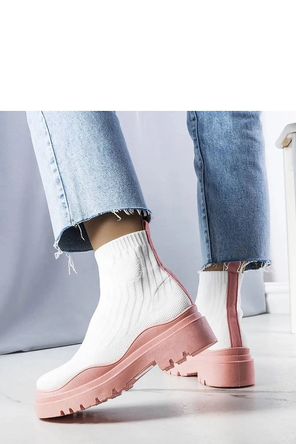 White sock boots with a pink sole