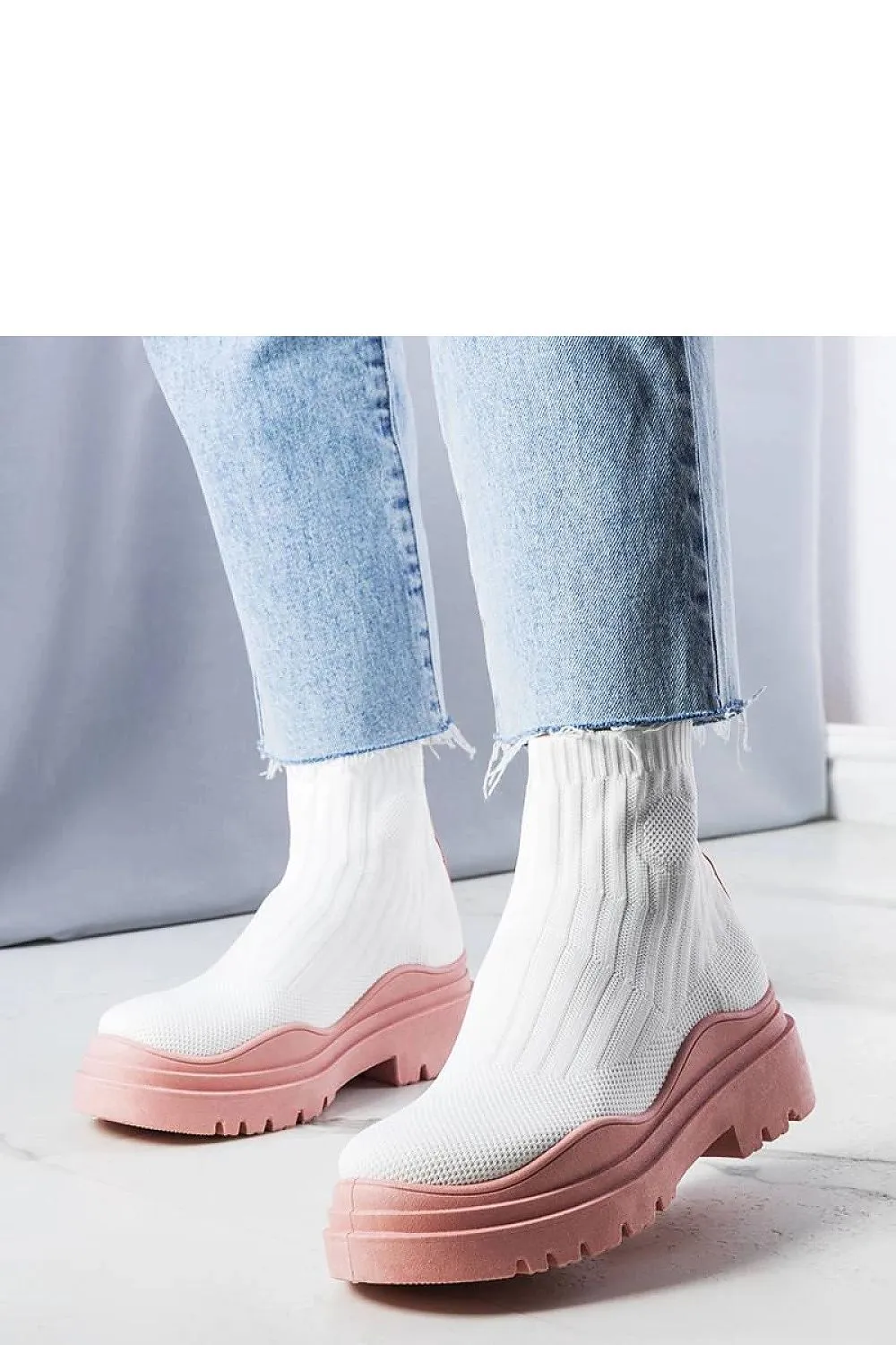 White sock boots with a pink sole