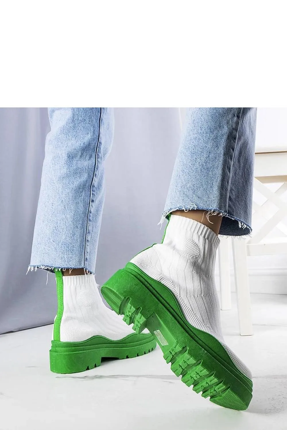 White sock boots with a pink sole
