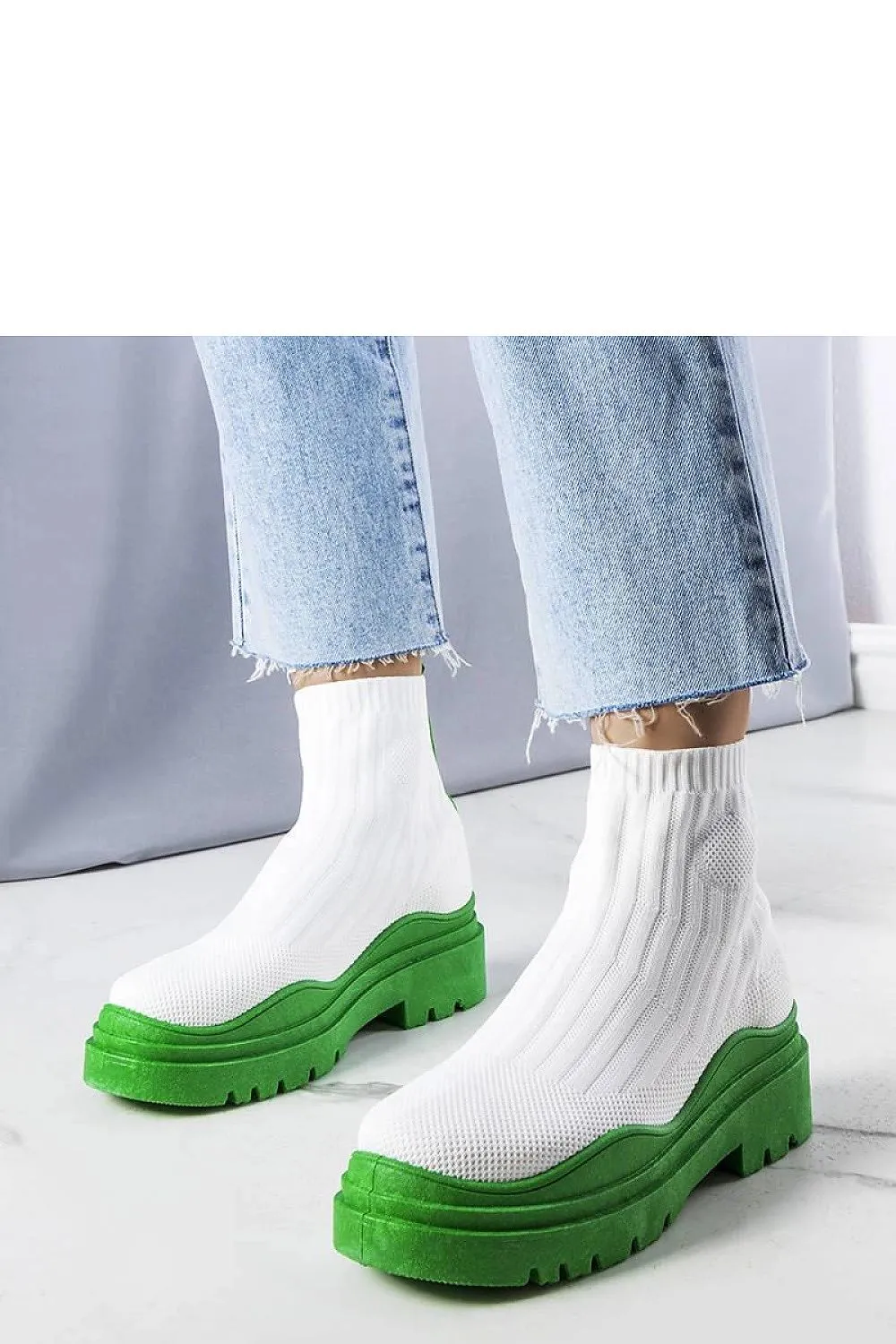 White sock boots with a pink sole