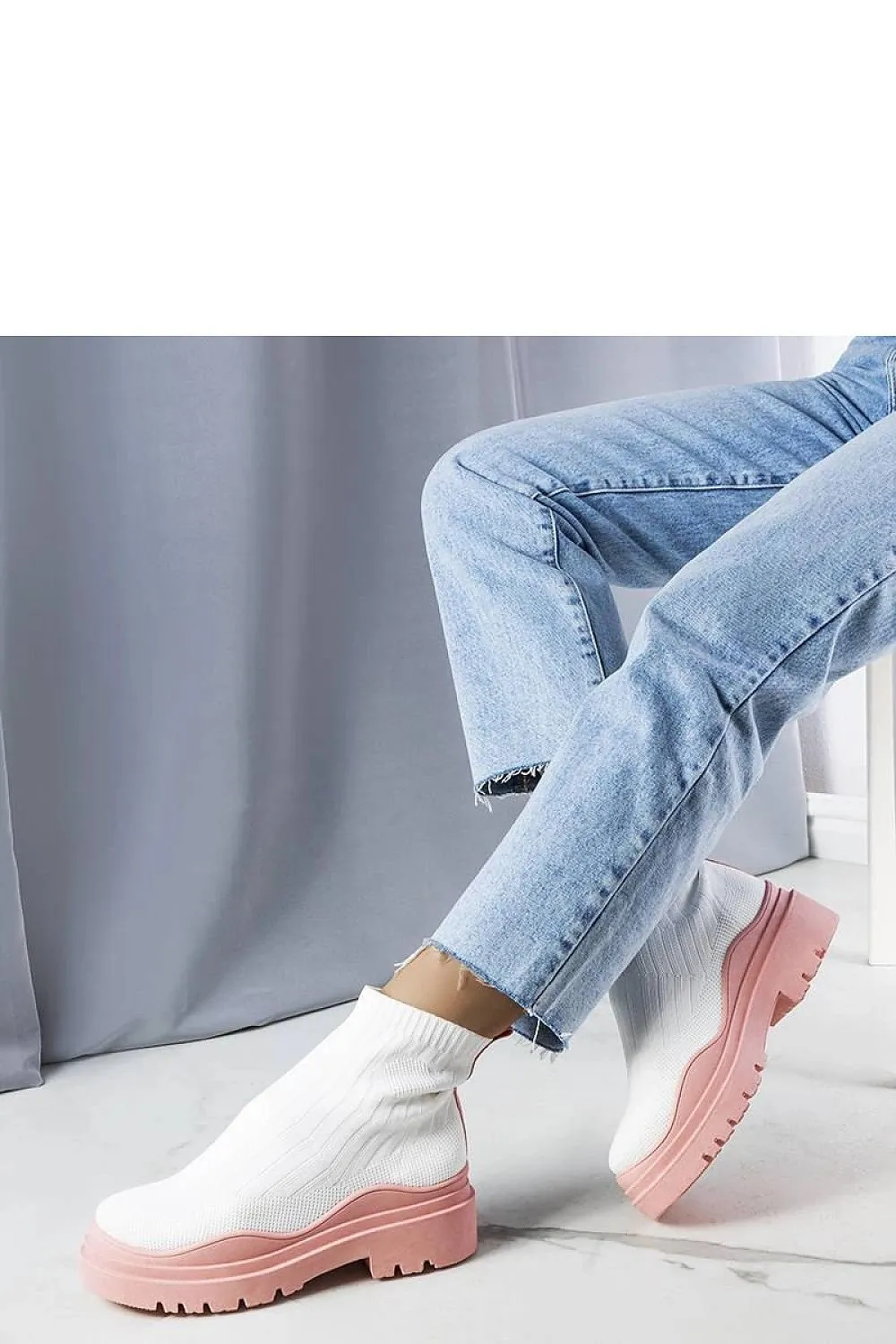 White sock boots with a pink sole